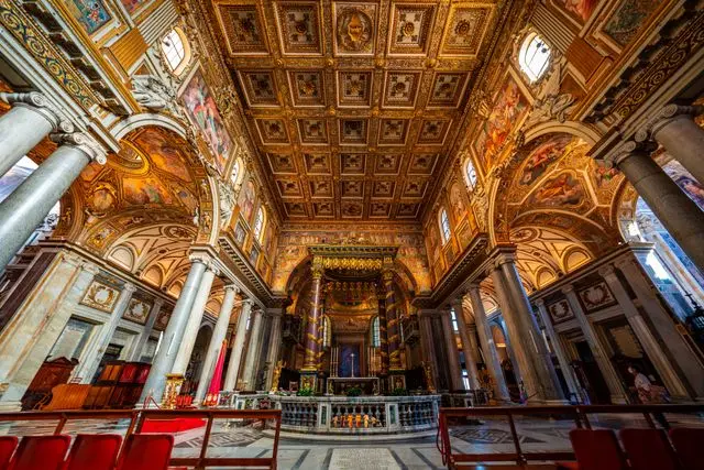 Elaborately decorated nave and altar inside Basilica di Santa Maria Maggiore