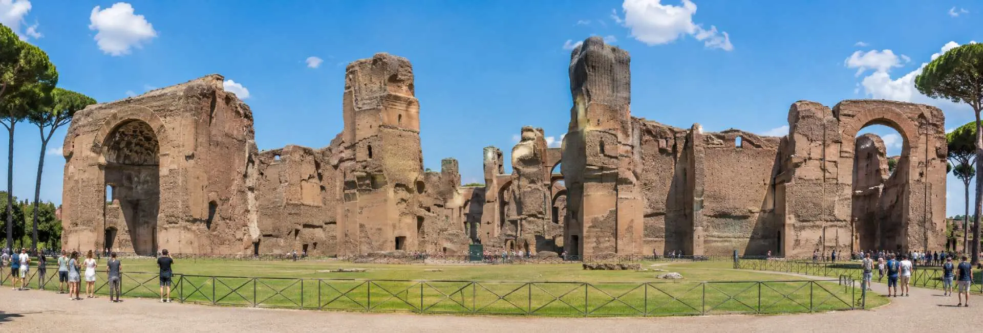 Baths of Caracalla ruins in Rome under a bright blue sky