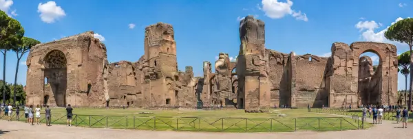 Baths of Caracalla ruins in Rome under a bright blue sky