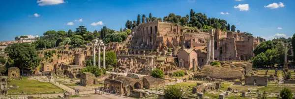 Palatine Hill in Rome with ancient Roman ruins, columns, arches, and Mediterranean greenery