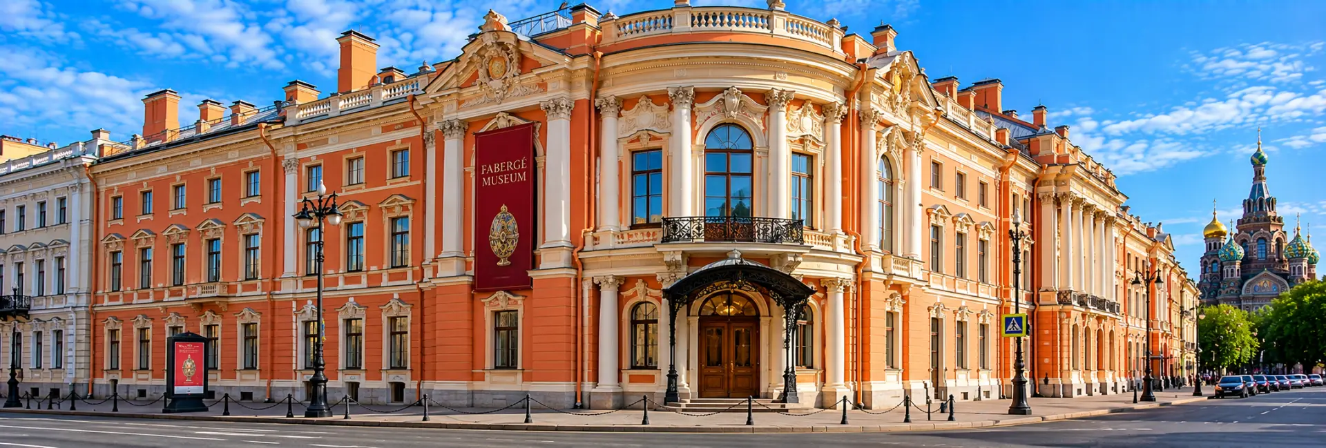 Fabergé Museum in St. Petersburg with its ornate coral and white historic façade