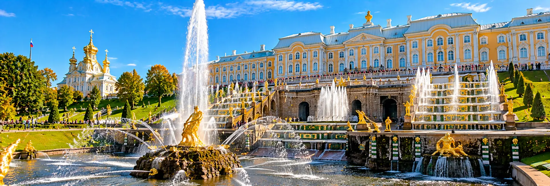 Peterhof Palace and Grand Cascade with ornate fountains and golden statues in St. Petersburg