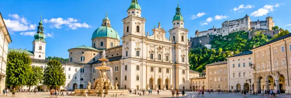 Salzburg Cathedral with its Baroque facade and green domes in Salzburg Old Town, Austria.