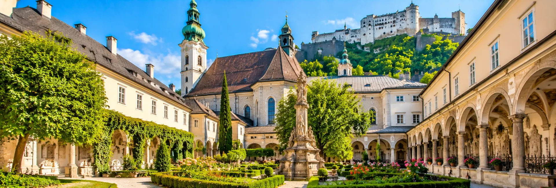 St. Peter’s Abbey in Salzburg with its historic church, courtyard and Hohensalzburg Fortress above.