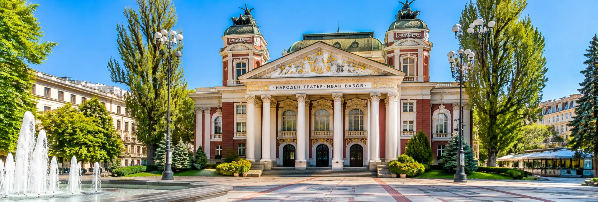 Ivan Vazov National Theatre in Sofia, Bulgaria, featuring its grand neoclassical facade and ornate columns.