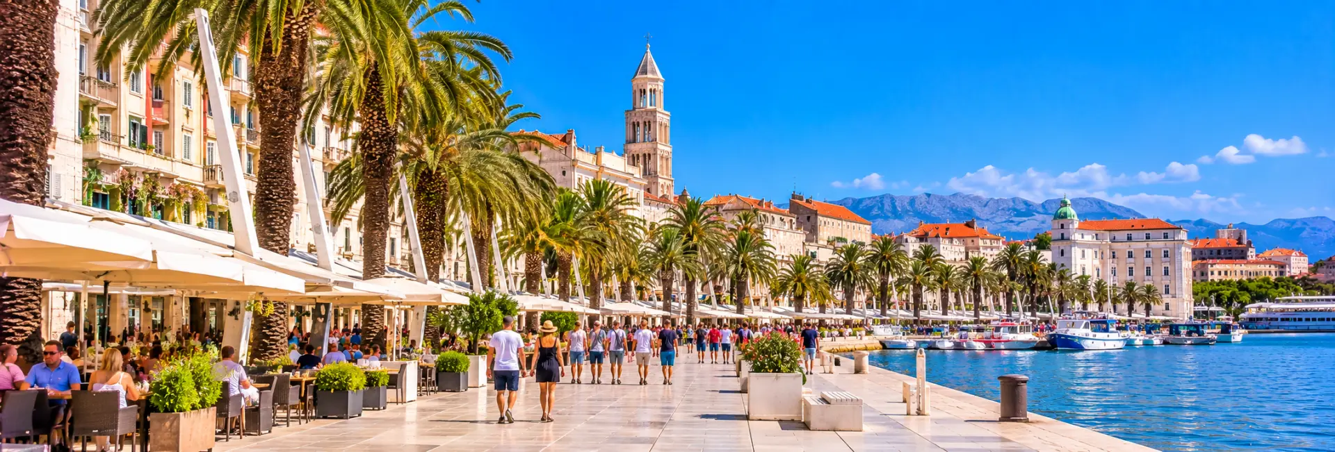 Riva Promenade in Split, Croatia, lined with palm trees, cafés and historic buildings along the Adriatic