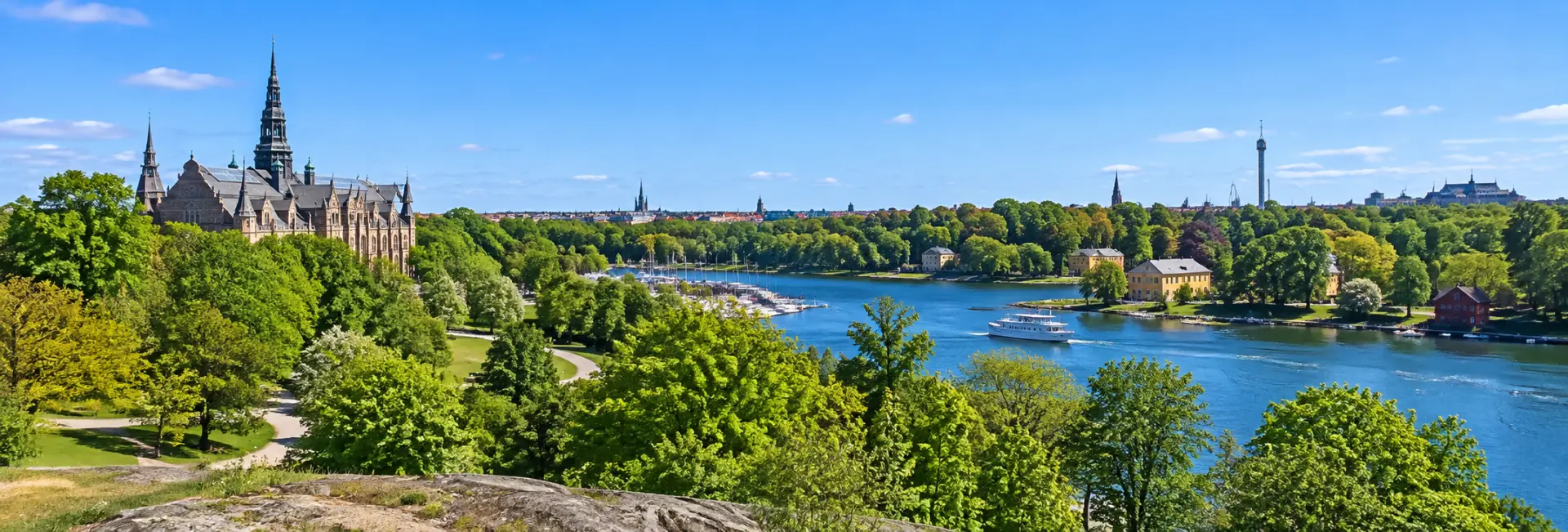 Royal National City Park with lush greenery, waterways and Stockholm skyline in Sweden