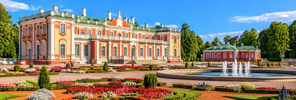 Kadriorg Palace in Tallinn, Estonia, featuring elegant Baroque architecture, colorful flower gardens and fountains.