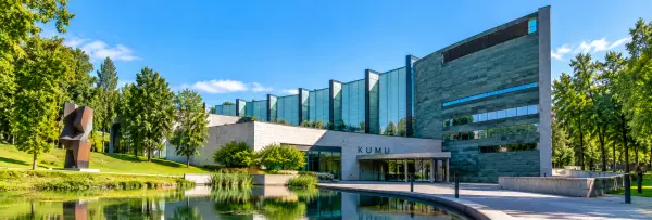 Kumu Art Museum in Tallinn, Estonia, featuring modern architecture, glass façades and landscaped surroundings.