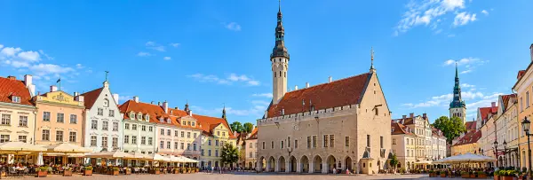 Tallinn Town Hall in Estonia, featuring its medieval Gothic architecture, tall spire and historic Town Hall Square.