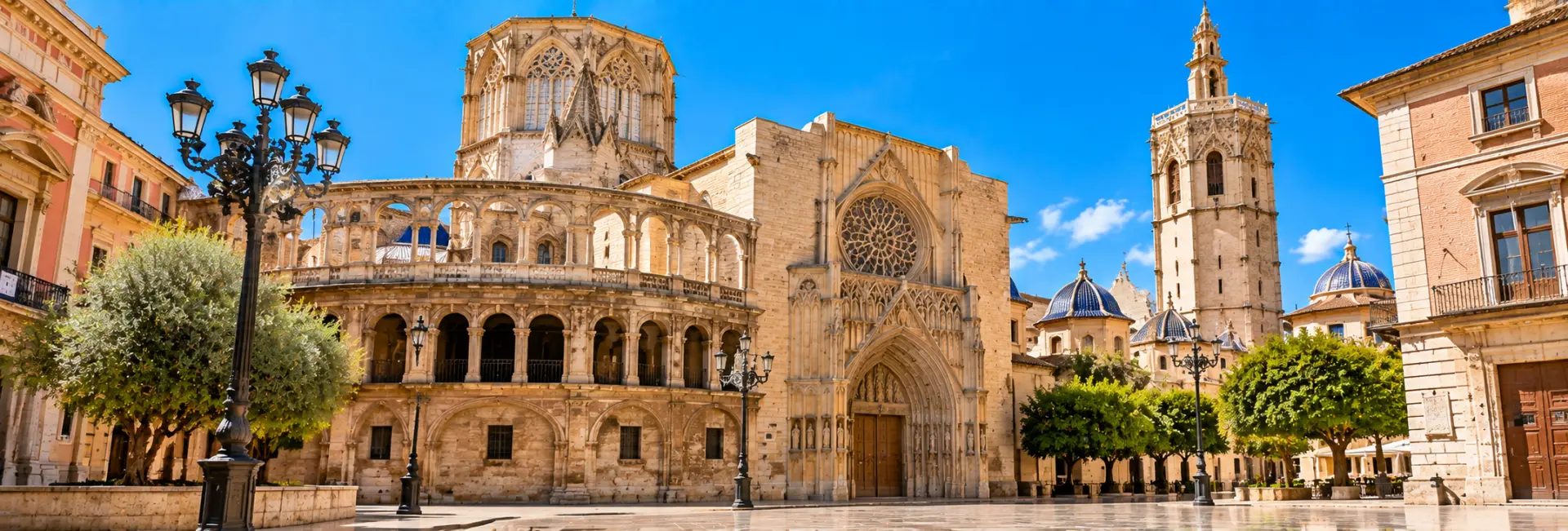 Valencia Cathedral in Spain, featuring its Gothic façade, ornate bell tower, and historic architecture.