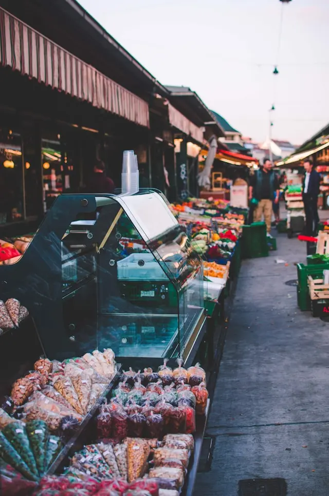 Naschmarkt in Vienna with colorful produce stalls and a busy market walkway