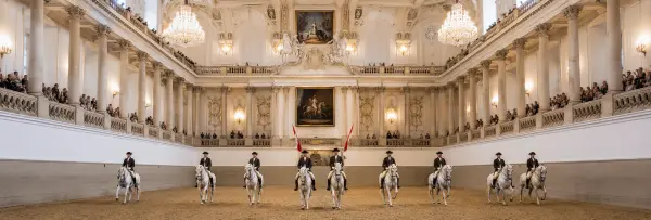 Spanish Riding School in Vienna with Lipizzaner horses performing in the historic riding hall