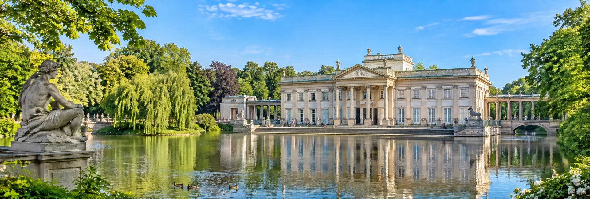 Łazienki Park in Warsaw with the neoclassical Palace on the Isle beside a reflective pond