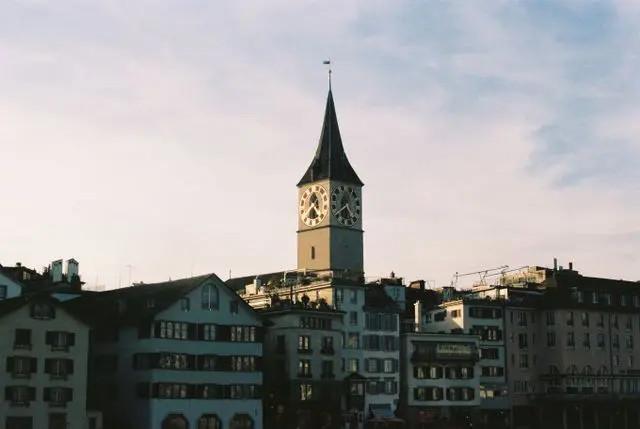 St. Peter’s Church in Zurich rising above the historic Old Town rooftops