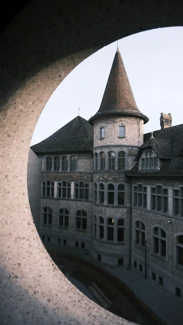 Swiss National Museum Zurich courtyard with historic stone architecture and a distinctive round tower
