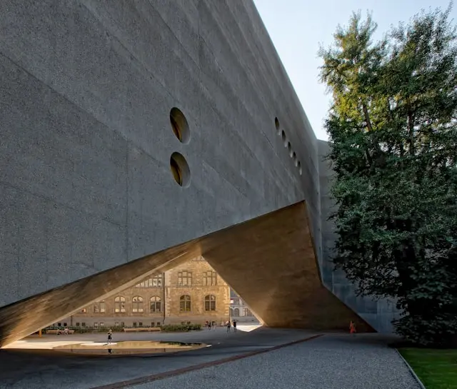 Swiss National Museum Zurich courtyard framed by modern concrete architecture and historic buildings