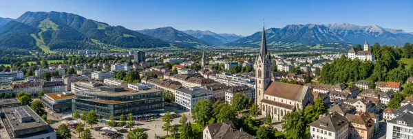 Dornbirn, Austria panoramic cityscape with Alps and historic church