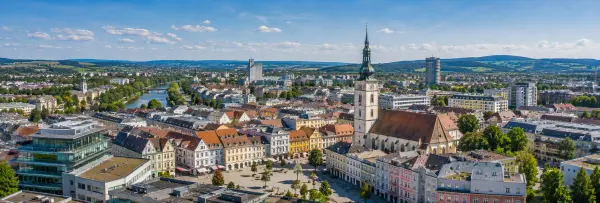Wels, Austria panoramic cityscape with historic church and rolling hills