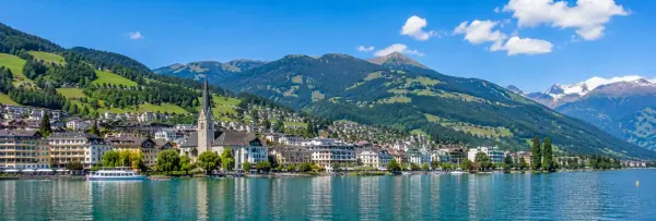 Zell am See Austria with Lake Zell, Alpine mountains and picturesque lakeside town