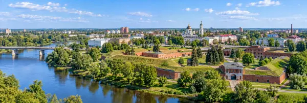Panoramic aerial view of Bobruisk, Belarus, featuring the historic fortress, Berezina River, city skyline, and Orthodox