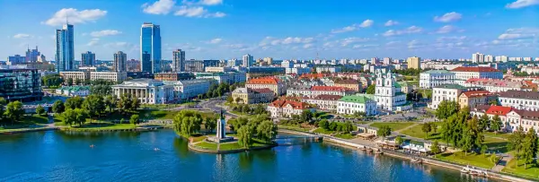 Panoramic view of Minsk, Belarus, with the Svislach River, Island of Tears and historic city skyline