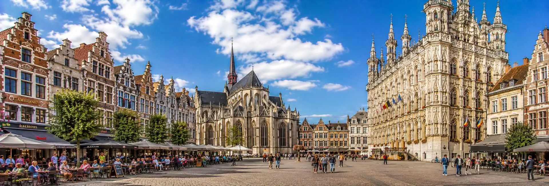 Leuven Belgium Grote Markt with Gothic Town Hall, St Peter's Church and historic buildings