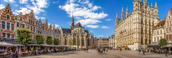Leuven Belgium Grote Markt with Gothic Town Hall, St Peter's Church and historic buildings