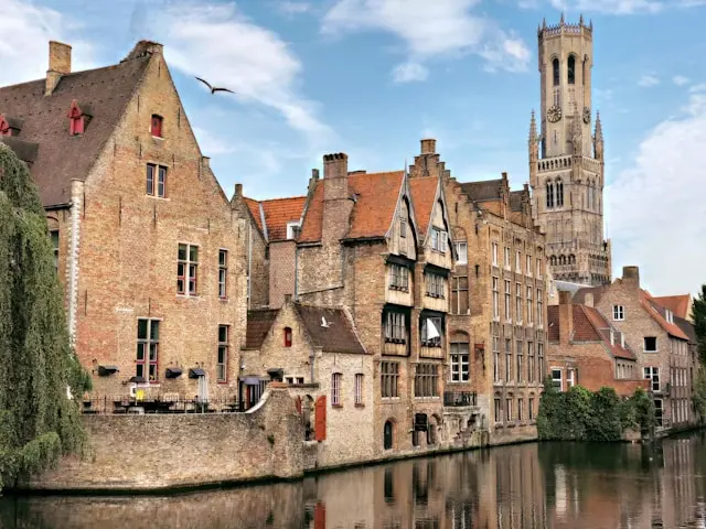 Belfry of Bruges overlooking a historic canal