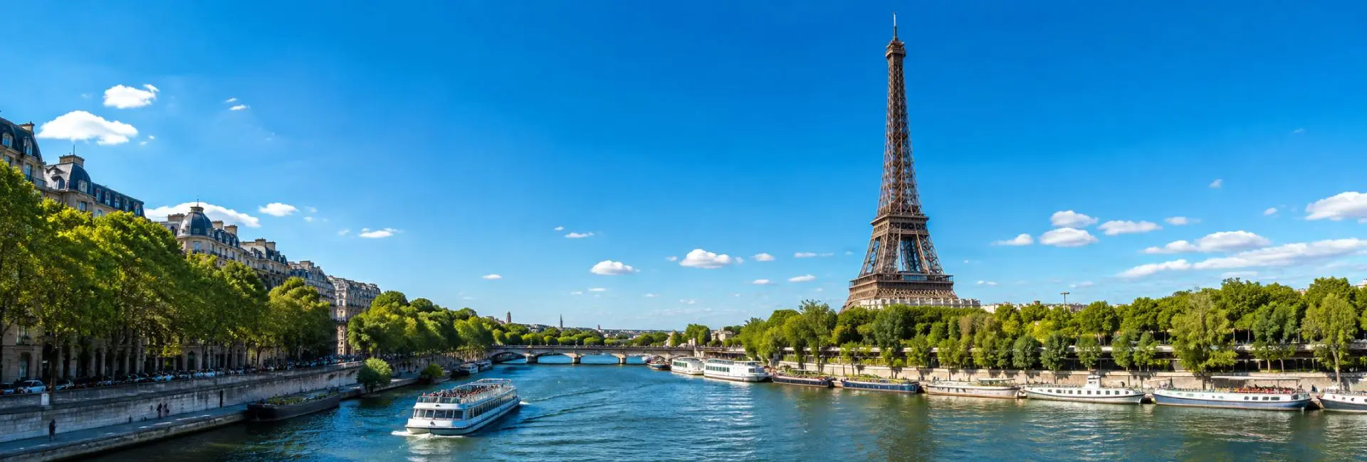 Paris panoramic cityscape with the Eiffel Tower, Seine River, bridges and historic buildings