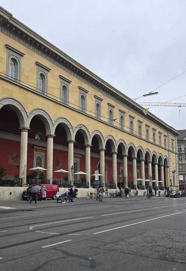 Historic arcade facade of the Munich Residenz with columns and arched walkways