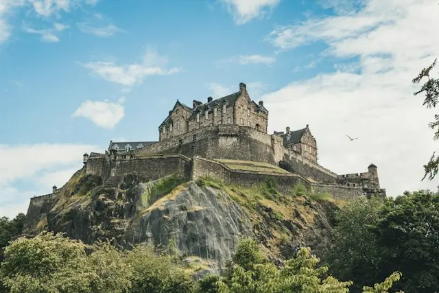 Edinburgh Castle perched on a rocky hill above the city