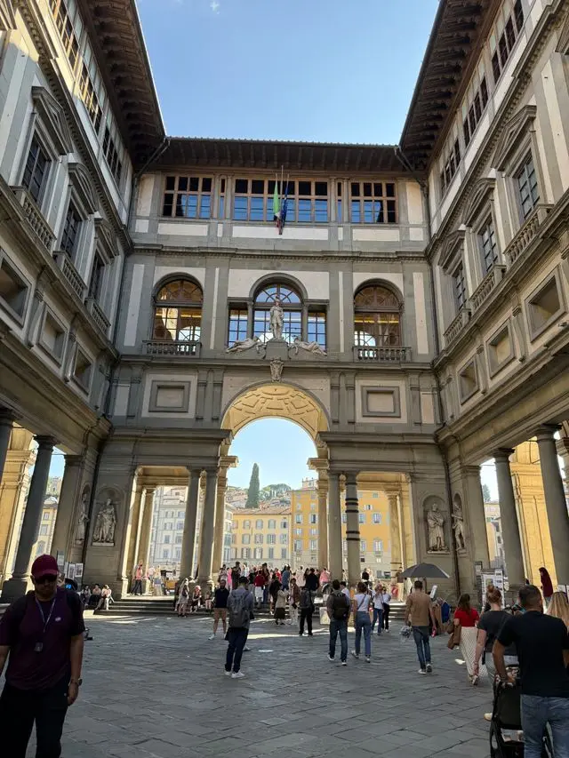Courtyard and archway of the Uffizi Gallery in Florence, Italy