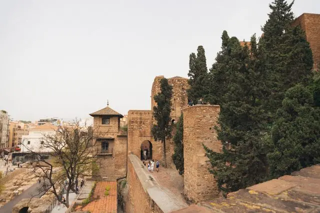 Alcazaba of Málaga in Spain, featuring ancient Moorish fortress walls, stone pathways, and historic defensive towers.