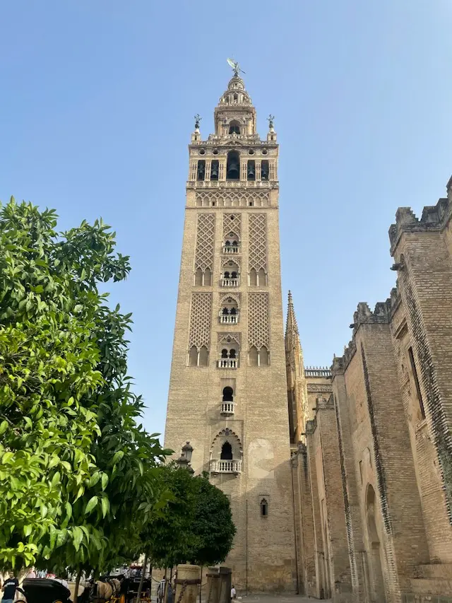 La Giralda bell tower rising above Seville Cathedral, Seville, Spain.