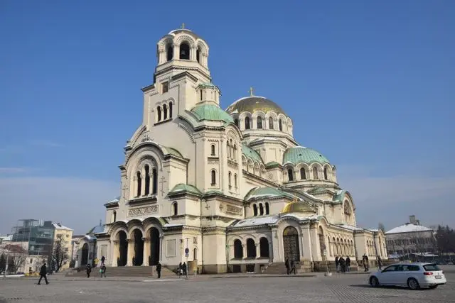 Alexander Nevsky Cathedral in Sofia, Bulgaria, featuring golden domes, grand arches, and Byzantine architecture.