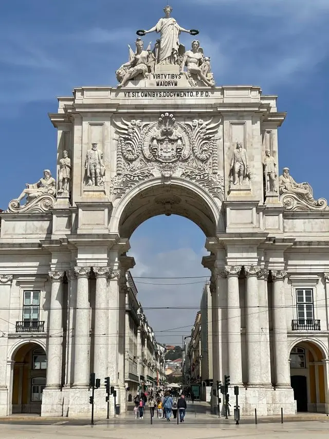 Rua Augusta Arch rising above a historic Lisbon street