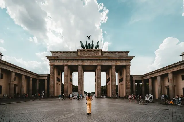 Brandenburg Gate in Berlin with visitors in the historic square