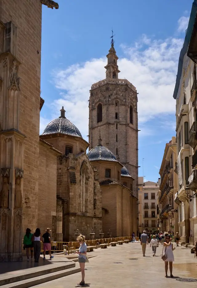 Valencia Cathedral and Miguelete bell tower rising above the historic streets of Valencia, Spain.