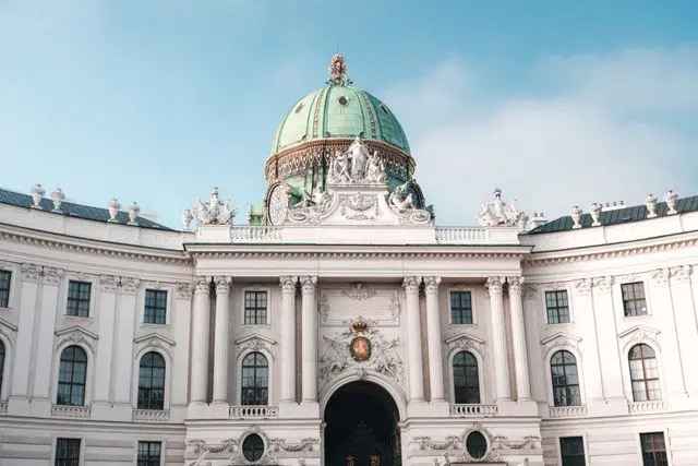Hofburg Palace in Vienna with its ornate dome and grand Baroque facade.