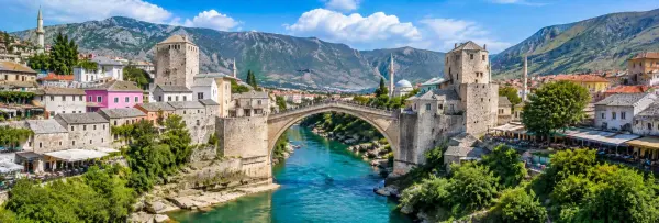Stari Most bridge over the Neretva River surrounded by historic Mostar, Bosnia and Herzegovina