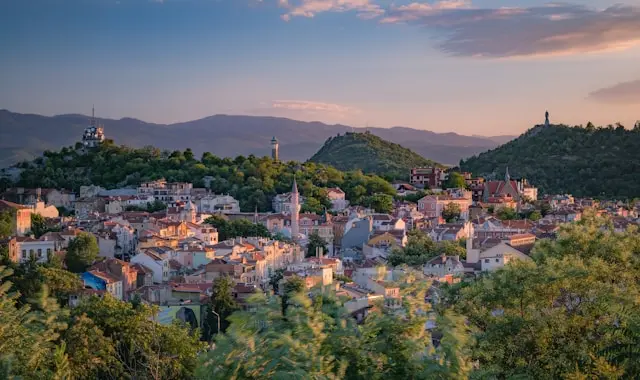 Panoramic view of Plovdiv, Bulgaria, with historic buildings and surrounding hills
