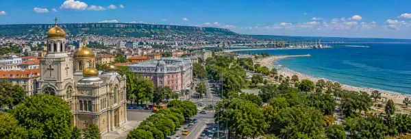 Varna Cathedral overlooking the city, Sea Garden, sandy beach and Black Sea coastline in Bulgaria.