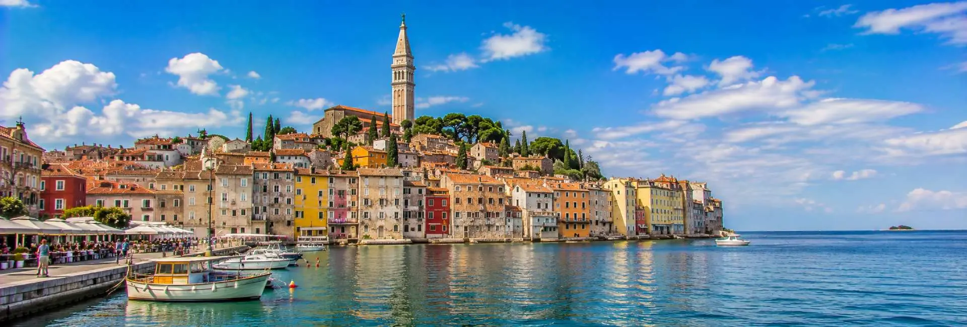 Rovinj Croatia Old Town with colorful waterfront houses, St Euphemia Church and Adriatic Sea