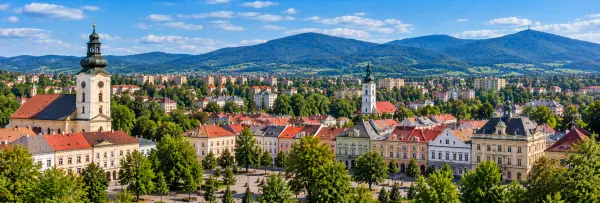 Panoramic view of Frýdek-Místek with historic buildings, church towers and the Beskydy Mountains