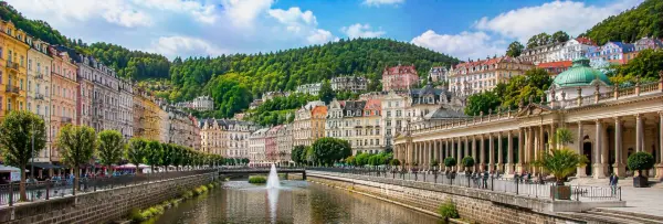 Karlovy Vary Czechia with historic spa buildings, Mill Colonnade and wooded hills