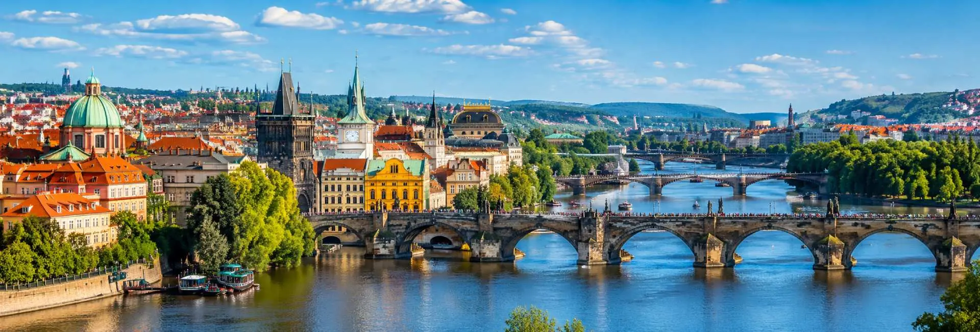 Prague panoramic cityscape with Charles Bridge over the Vltava River