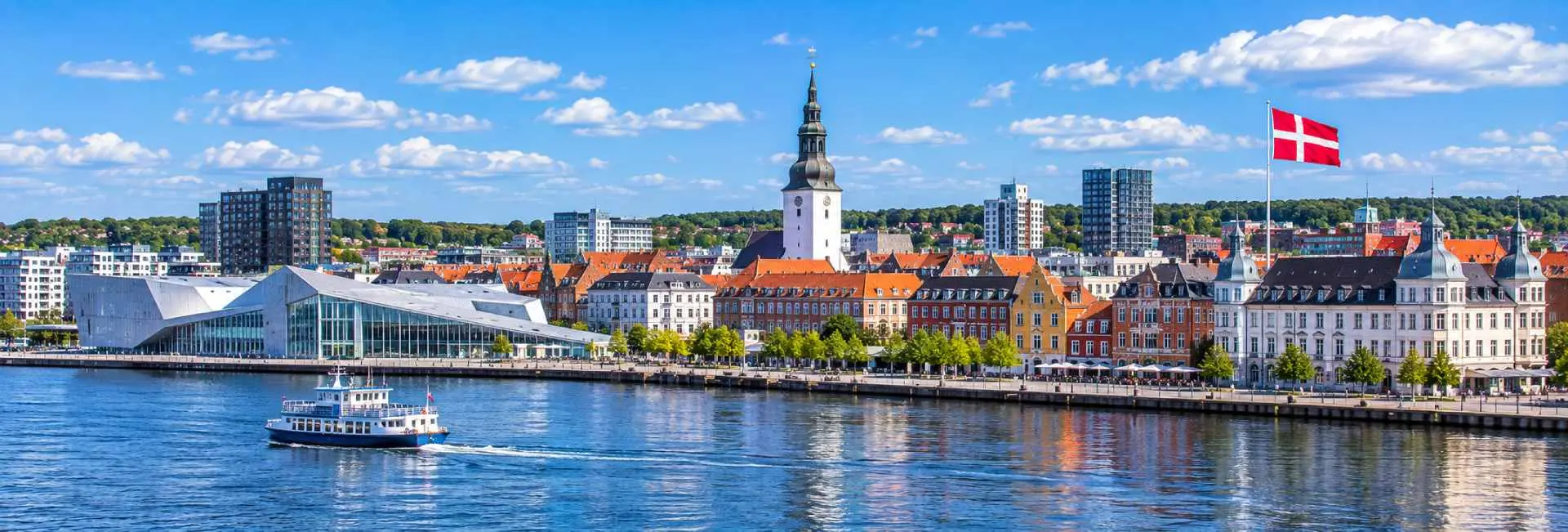 Aalborg, Denmark, with the Limfjord waterfront, historic city center, and Aalborg Cathedral