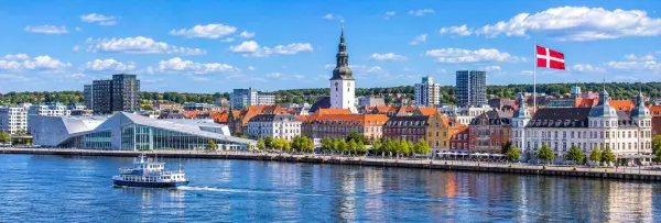Aalborg, Denmark, with the Limfjord waterfront, historic city center, and Aalborg Cathedral