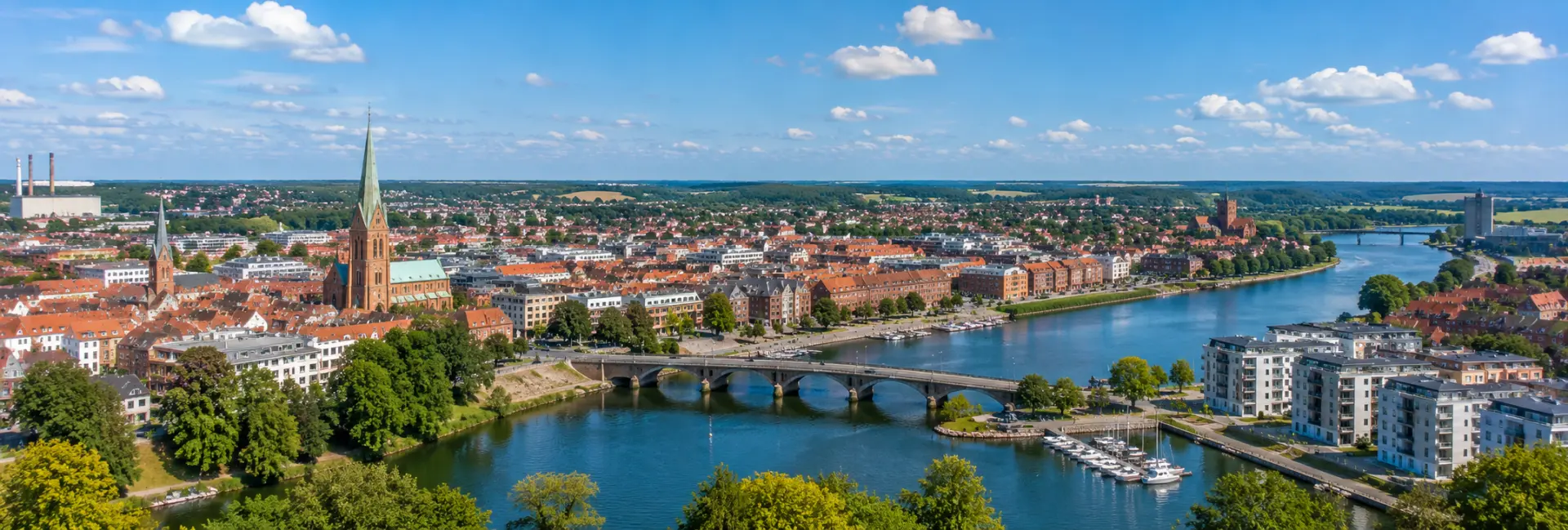 Aerial panoramic view of Randers, Denmark, with the historic city centre and Gudenå River